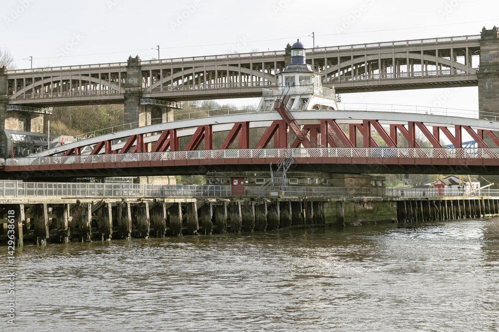 Beautiful view of Swing bridge and The High level bridge spanning the River Tyne connecting Newcastle upon tyne and Gateshead in North East England. use it as your Wallpaper, Poster and Space for text