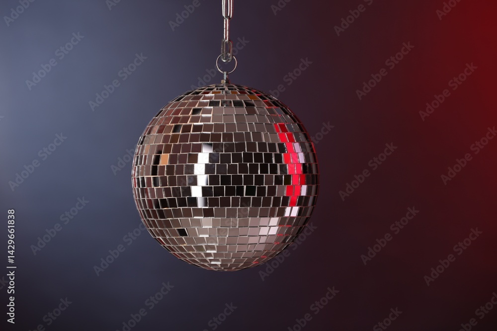 Obraz premium One shiny disco ball on dark background
