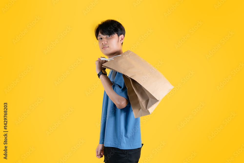a man with brown shopping bag in his shoulder a man with brown shopping bag in his shoulder
