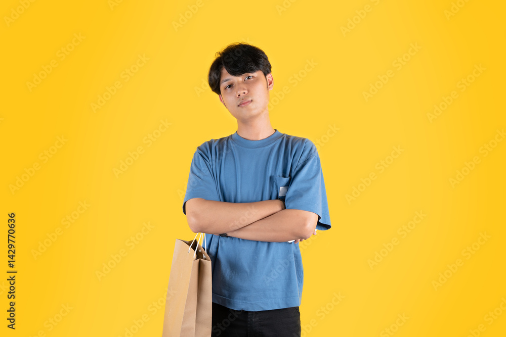a man with brown shopping bag while crossing his arms over his chest a man with brown shopping bag while crossing his arms over his chest