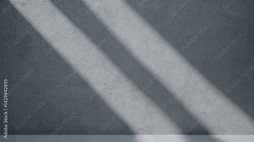 Fototapeta premium A textured gray wall with diagonal shadows cast across it, creating a minimalist and serene atmosphere.