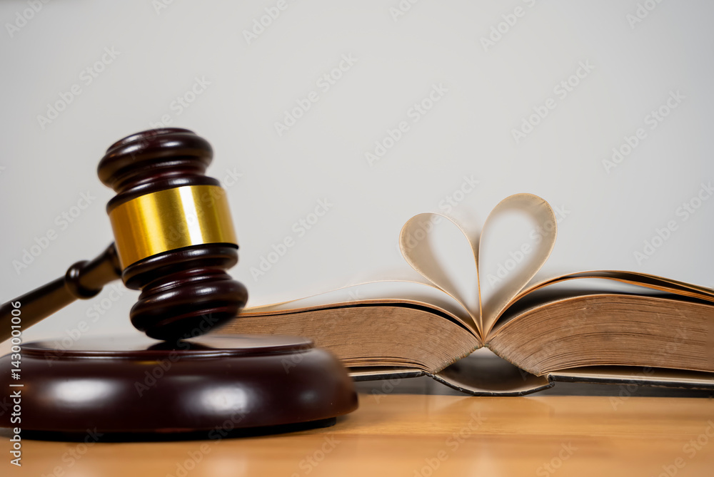 Mallet, legal code. A romantic and sentimental image featuring an open book with pages shaped into a heart. Mallet, legal code. A romantic and sentimental image featuring an open book with pages shaped into a heart.
