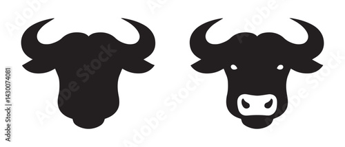 Two stylized black and white buffalo head silhouettes, perfect for logos, branding, or any project needing a strong, animalistic visual.