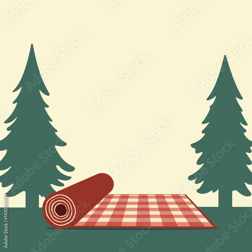 Picnic blanket rolled out among pine trees