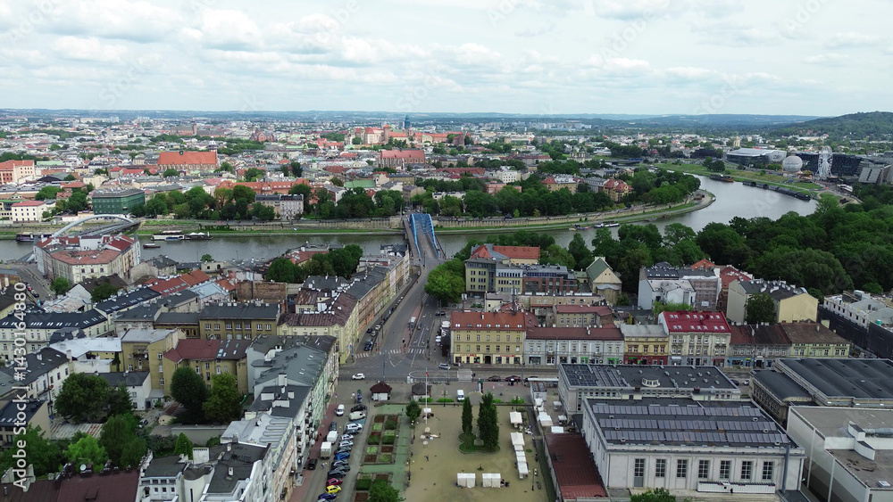 Panoramic aerial view of Krakow rooftops and forest