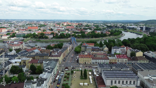 Obraz na płótnie Panoramic aerial view of Krakow rooftops and forest w salonie
