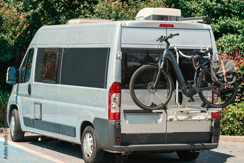 Obraz na płótnie Camper van with bike carrier parked outdoors w salonie