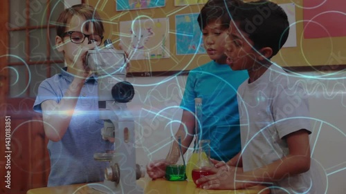 Focusing microscope, adjusting focus knob and pouring red liquid, boys exploring science education