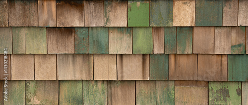 Photography horizontal color image of faded green blue painted wooden shingles or shakes on