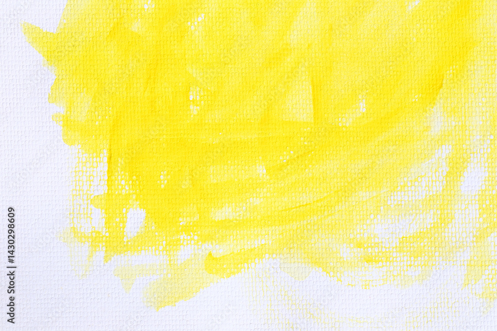 Yellow watercolour paint brush on the white art paper background.