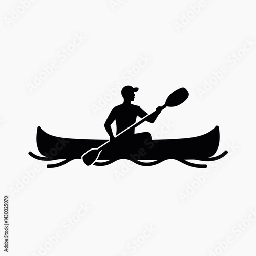 canoeist paddling in black and white silhouette