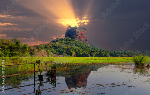 Majestic Majestic Sigiriya Rock  Fortress in Sri Lanka with Scenic golden sunlight Landscape view background.k  Fortress in Sri Lanka with Scenic golden sunlight Landscape view background.
