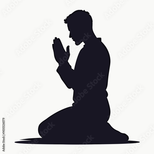 silhouette of man praying in black and white