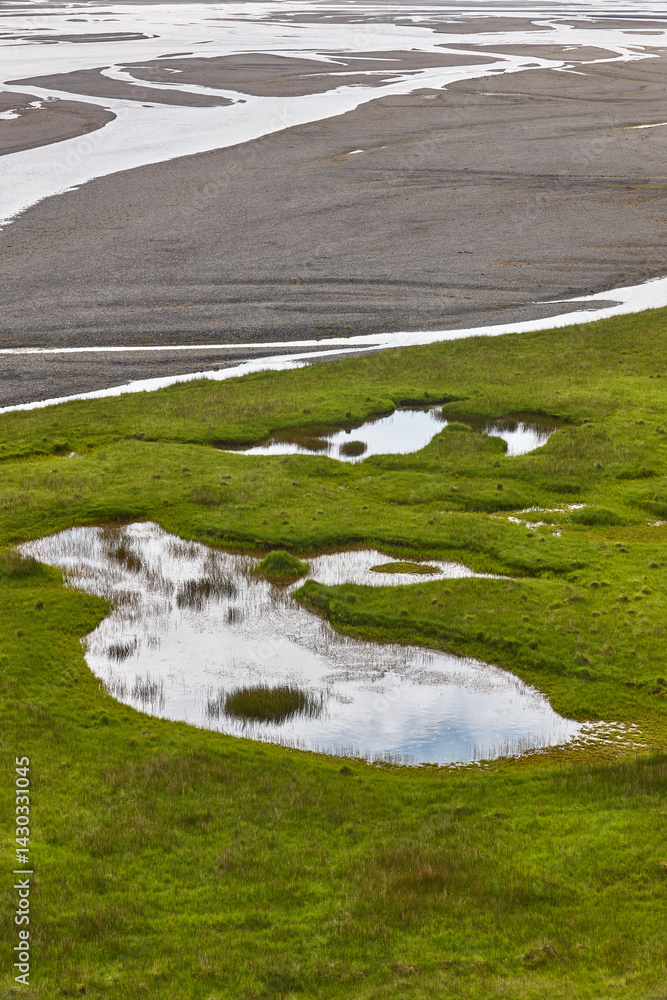 Lake coastline scenery in Lonsvik area. East fjords. Iceland