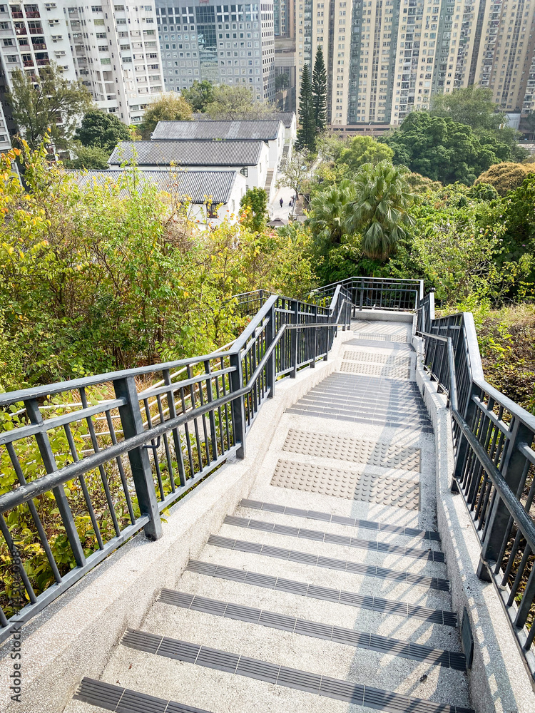 Concrete Stairway Leading to a Cityscape View in Hong Kong