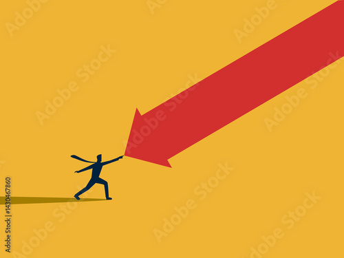 Trying to overcome business challenges, Businessman fights with the falling arrow