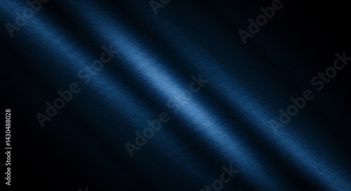Abstract Dark Blue Background with Diagonal Light Rays and Textured Surface