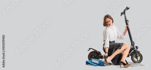 Tired young businesswoman w...
