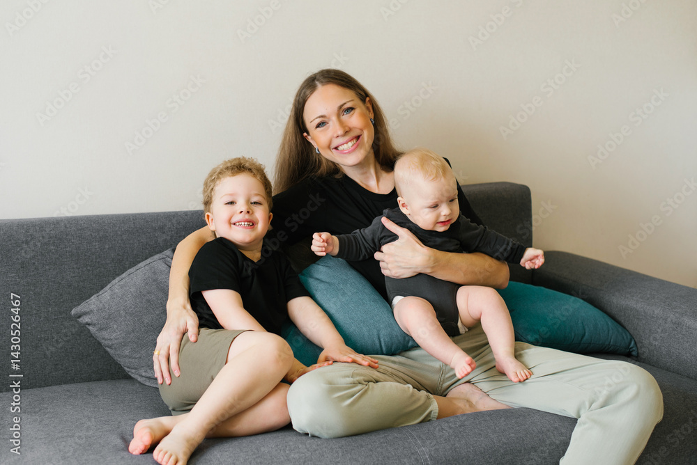 Smiling Mother With Two Sons
