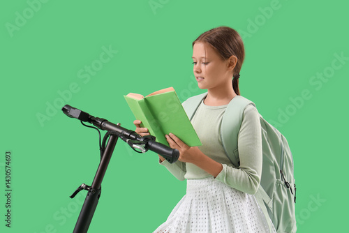 Cute schoolgirl doing homew...