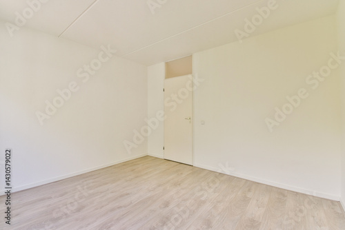A spacious, minimalist empty room featuring white walls and a light wooden floor, ideal for various interior design possibilities and renovations.