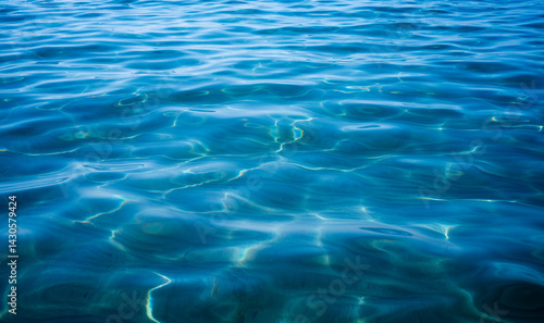 Blue clear sea water with waves, ocean tropical turquoise surface background