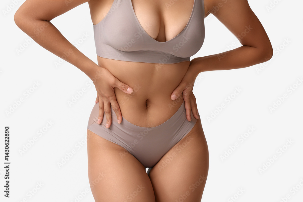 Beautiful young African-American body positive woman on grey background, closeup