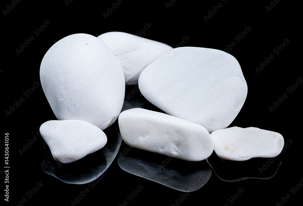 Smooth White Pebbles on Reflective Black Surface, Minimalist Still Life