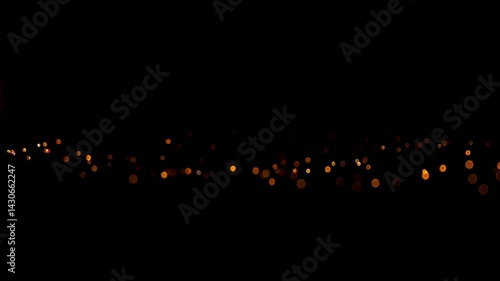 Abstract background with small glowing orbs resembling fireflies  