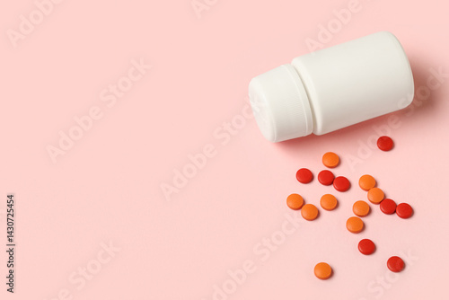 Jar with different pills on...