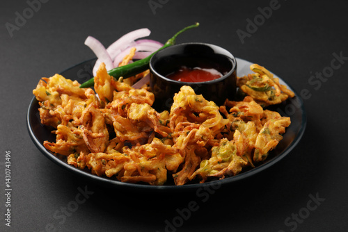 Indian street food snack called onion pakoda making gram flour and onion