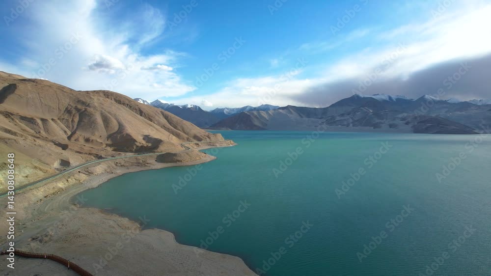 Breathtaking views of Baisha Lake on the Pamir Plateau in southern Xinjiang showcase nature's beauty at dusk Breathtaking views of Baisha Lake on the Pamir Plateau in southern Xinjiang showcase nature's beauty at dusk