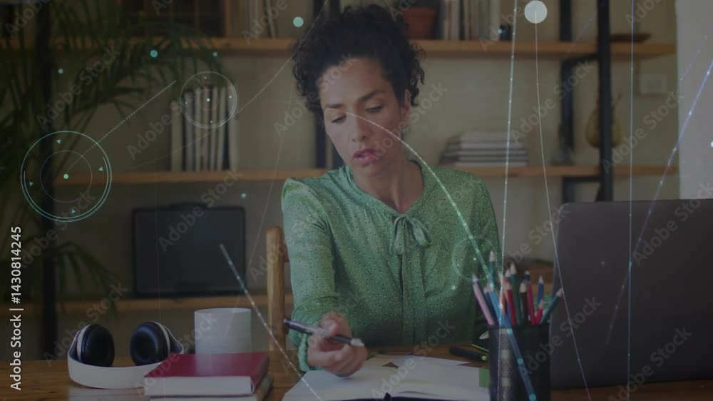 woman writing in home office, with floating technology data charts and laptop analytics animations woman writing in home office, with floating technology data charts and laptop analytics animations