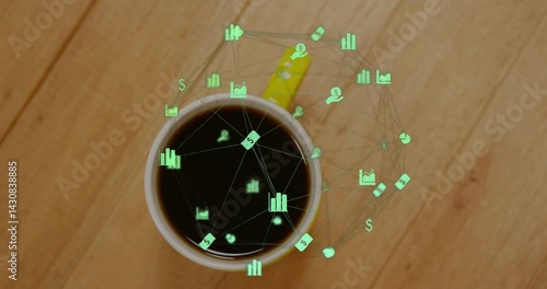 Yellow ceramic coffee mug being wrapped by glowing finance icons in green circular holographic ring