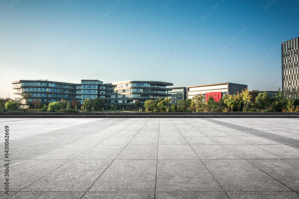 Modern Urban Architecture Against a Clear Sky with Expansive Pavement