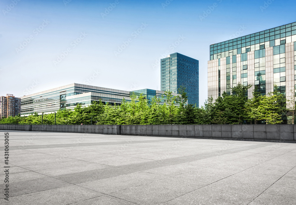 Modern Urban Cityscape with Greenery in Clear Blue Sky