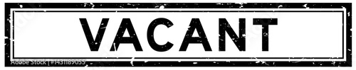 Grunge black vacant word square rubber seal stamp on white bacckground