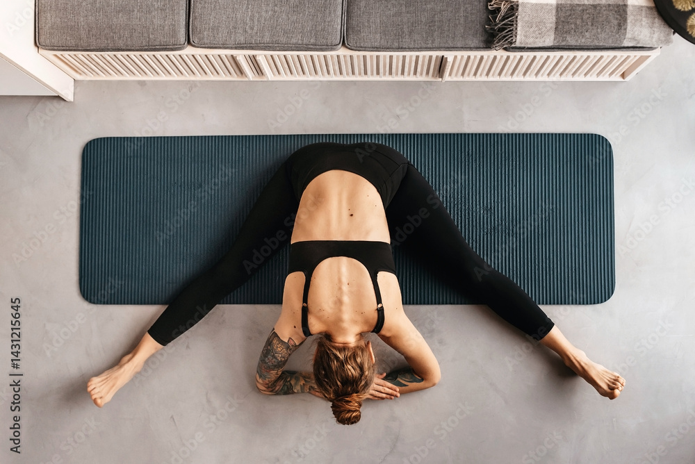 Woman Doing Yoga Exercise on Mat Top View