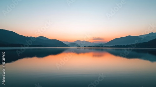 Wallpaper Mural Serene lake sunrise reflecting mountains. Calm waters mirror the vibrant sunrise hues over distant mountain ranges. Tranquil morning light paints the scene Torontodigital.ca