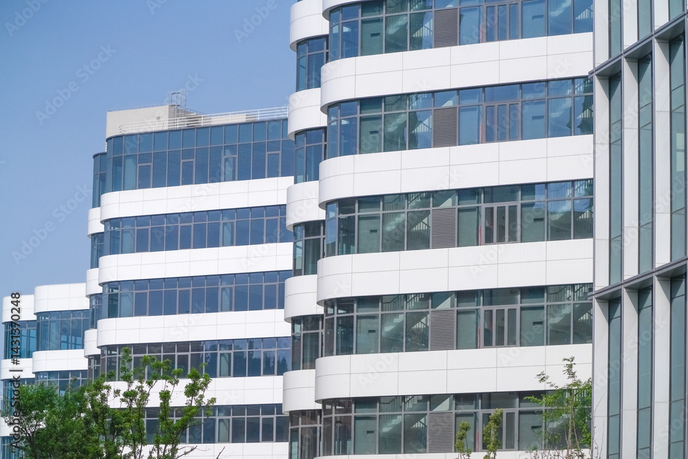 modern office building exterior in industrial area modern office building exterior in industrial area