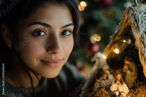 Obraz na płótnie A Hispanic woman setting up a nativity scene during Christmas season at home, capturing a serene moment of spiritual devotion with warm lighting and symbolic holiday decorations in the background. w salonie