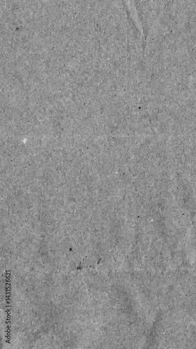 Grey kraft paper noise texture vertical stop motion video. Old page overlay effect background loop animation. Vintage paper texture with crease, stain, grain, dust particles. Empty animated backdrop