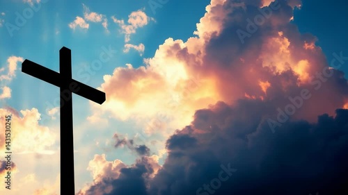 Silhouette of a christian cross against a dramatic cloudy sky with vivid colors, conveying themes of faith, spirituality, and hope.
