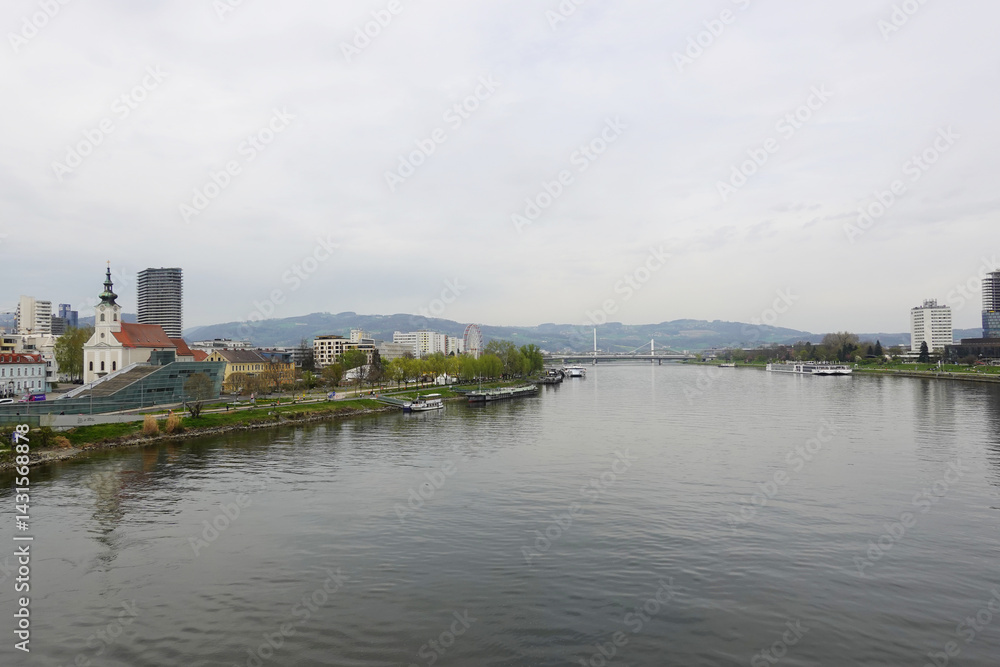 A riverside embankment in Linz, the river Danube, Austria