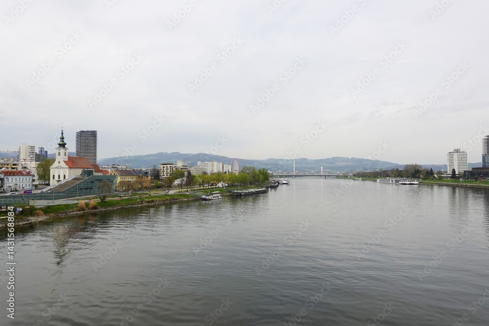 A riverside embankment in Linz, the river Danube, Austria