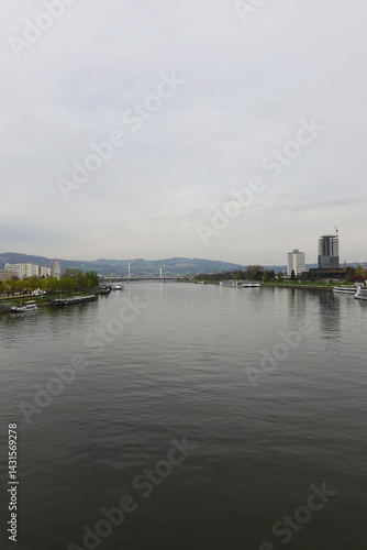 Obraz na płótnie A riverside embankment in Linz, the river Danube, Austria w salonie