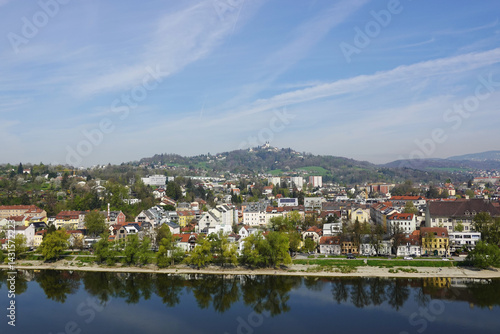 Obraz na płótnie A riverside embankment in Linz, the river Danube, Austria w salonie