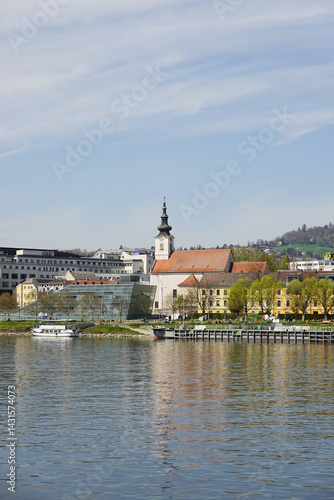 Obraz na płótnie A riverside embankment in Linz, the river Danube, Austria w salonie