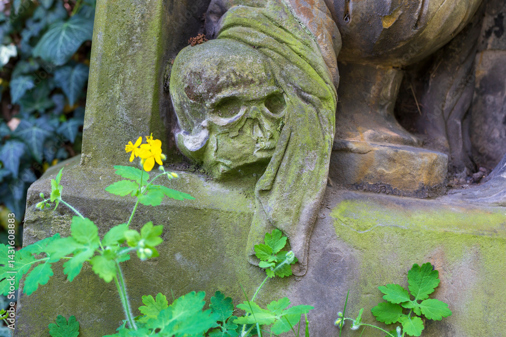 Historic Statue on the spring mystery old Prague Cemetery, Czech Republic