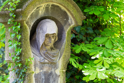 Obraz na płótnie Historic Statue on the spring mystery old Prague Cemetery, Czech Republic w salonie